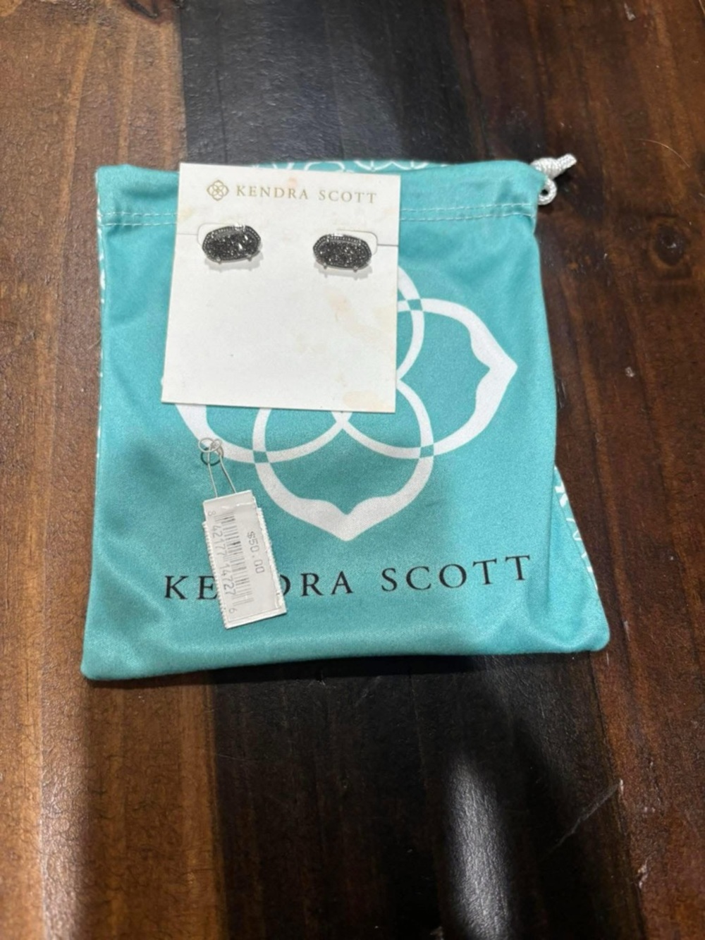 Kendra Scott silver druzy stud earrings.